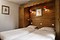 Catered Ski Chalet Caron bedroom, skiing holidays in Val Thorens, France at Independent Ski Links Catered Ski Chalet Caron bedroom, skiing holidays in Val Thorens, France at Independent Ski Links