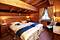 Catered Chalet Davos bedroom, skiing in Val d'Isere, France at Independent Ski Links
