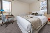 Lovely bedroom in Les Chalets du Jardin Alpins apartments at Independent Ski Links