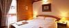 Chalet Les Etoiles double bedroom, skiing in Meribel, France at Independent Ski Links