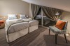 Twin bedroom in the apartments Les Chalets du Jardin Alpin at Independent Ski Links Twin bedroom in the apartments Les Chalets du Jardin Alpin at Independent Ski Links