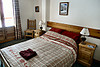 Catered Chalet Bonjour bedroom, skiing in Tignes, France at Independent Ski Links Catered Chalet Bonjour bedroom, skiing in Tignes, France at Independent Ski Links