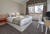 Double bedroom in apartment Les Chalets du Jardin Alpin Val d'Isere at Independent Ski Links
