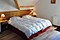 Chalet Grande Etoile bedroom, skiing in Alpe D'Huez, France at Independent Ski Links