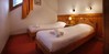 Chalet des Neiges Plein Sud twin bedroom at Independent Ski Links