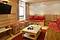 Catered Chalet Tichot living room skiing holidays in Tignes France at Independent Ski Links Catered Chalet Tichot living room skiing holidays in Tignes France at Independent Ski Links