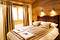 Catered Chalet Valdez Suite bedroom, skiing in Morzine, France at Independent Ski Links
